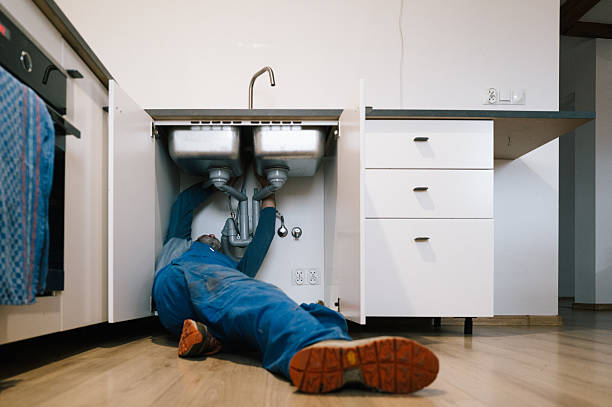 Professional Drain Cleaning technician working in Riceville, TN
